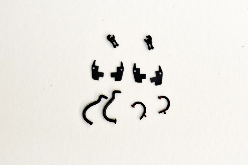 Contents, minus the already fitted tension lock couplings, of the accessory pack of parts to be fitted, as required, by the modeller.