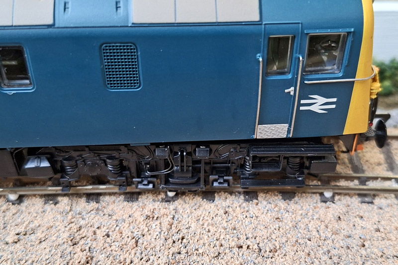 The bogie frames appears to be made to true 4mm scale rather than a OO gauge compromise. Like the majority of 4mm scale Southern Electric models the pickups align outside of conductor rail fitted to OO/HO track.